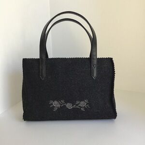 Black wool hand held purse